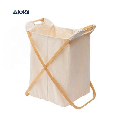 China Minimalist Aioiai Folding Wooden Laundry Basket And Canvas Bag for sale