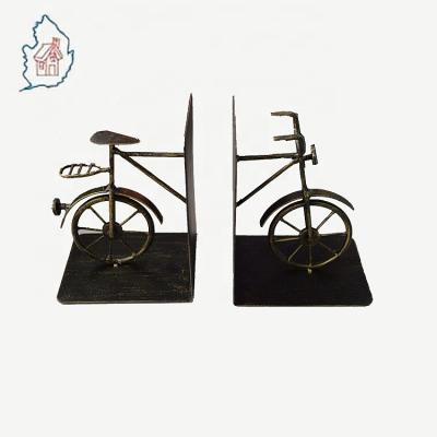 China Book Stand Up Own Mold Bike And Bicycle Shape Special Kids Metal Bookends for sale