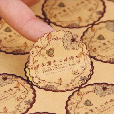 China Fancy Sticker Die Cut Waterproof Custom Logo Kraft Paper Vinyl Adhesive Label Printing for sale