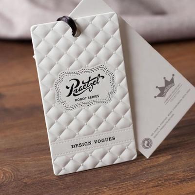 China Sustainable Luxury White Embossed /letterpress Printing Paper Hang Tag for sale