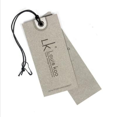 China Sustainable Good Printing Blue Paper Swing Label / Hang Tags For Jeans for sale