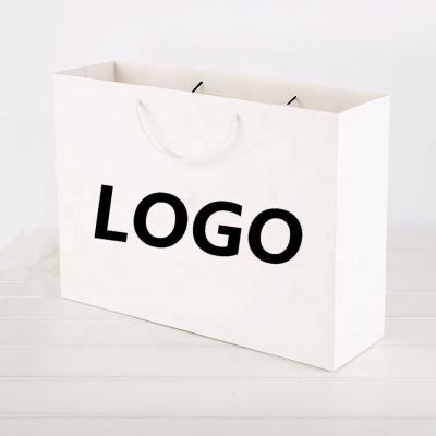 China Cheap Luxury White Cardboard Retail Goods Recyclable Customized Shopping Packaging Paper Bags For Garments / Apparel Packaging for sale