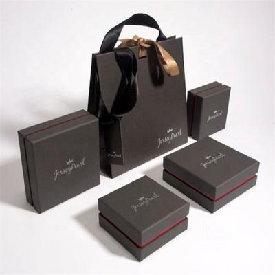 China Small Recyclable Luxury Paper Jewelry Bags for sale