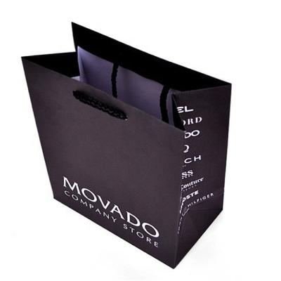 China Beautiful Recyclable Black Matte Laminated Design Paper Optical Gift Bag for sale