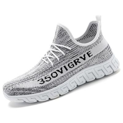 China Fashion trend YEZY shoes for men fly mesh surface breathable anti-skid running shoes for men casual sneakers for sale