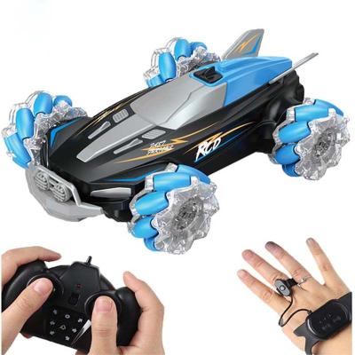 China Handle Air Gesture 2.4G RC Stunt Car Remote Control Toy For Kids Demo Spray 360 Remote Control Car Double Rotation Auto Stunt RC for sale