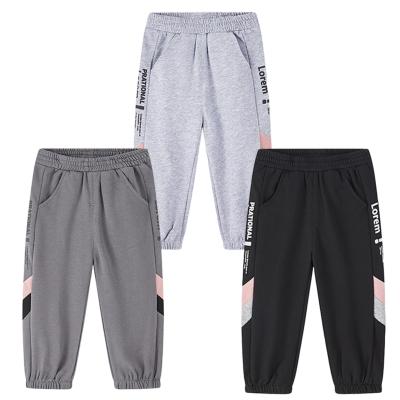 China Color Fade Proof Children Cotton Pants Casual Letter Printing Autumn/Spring/Winter Sports Pants Running Sweatpants for sale