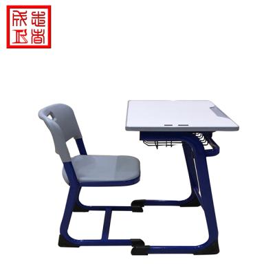 China Modern Modern Ergonomic Metal Classroom Furniture School Desk And Chair for sale