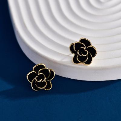 China Retro and modern New French vintage black dripping camellia earrings S925 Silver needle flower earrings wholesale for sale