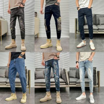 China Hot New Summer Men's QUICK DRY Slim Straight Ripped Jeans Men Pants Manufacturers Wholesale for sale