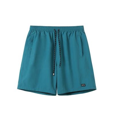 China 2022 TongRui Anti-Wrinkle Anti-Wrinkle Fashion Shorts Custom Summer Gym Man Simple Green Shorts for sale