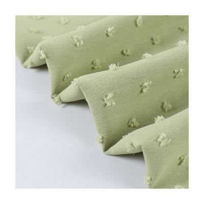 China Fabulous soft 100% polyester jacquard dobby polka dot chiffon fabric and textile for dress for sale