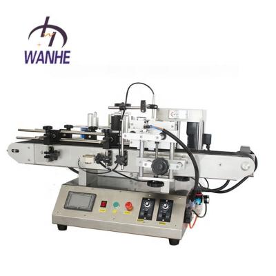 China Food Wanhe Factory Semi Automatic Jar Round Bottle Labeling Machine Label Equipment Manual Sticker Labeling Machine For Plastic Glass for sale