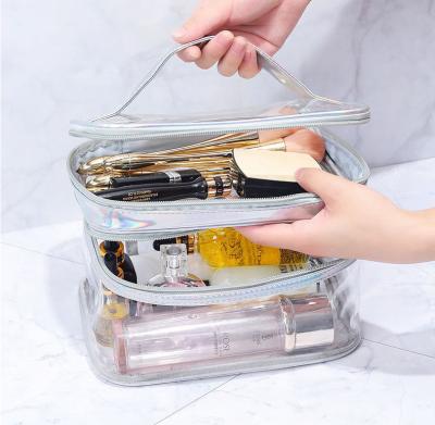 China Multi Function Double Layer Cosmetic Bag Organizer Toiletry Bag Waterproof Large Makeup Bag Waterproof Clear Transparent Makeup Case for sale