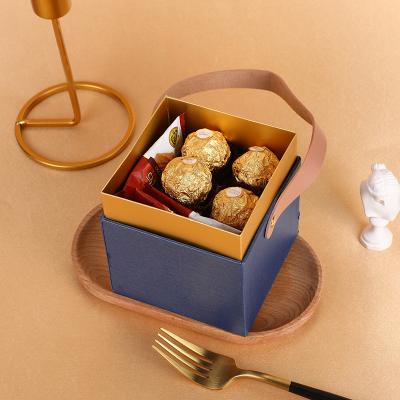 China Recycled Materials Printing Logo Party Gift Boxes Wedding Bridal Candy Gift Cardboard Handle Packaging Box With Lid for sale