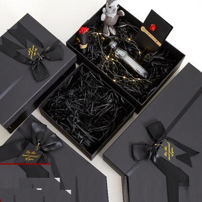 China Recycled Materials Custom Design Luxury Empty Rigid Cardboard Packaging Ribbon Bowknot Handmade Paper Gift Box With Logo Printed for sale