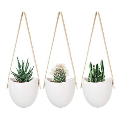 China Modern Indoor Round Ceramic Home Plant Wall Hanging Porcelain Garden Balcony Succulent Pot Planter For Outdoor Plants for sale