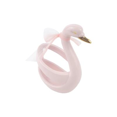 China Sustainable Pink Swan Shaped Ceramic Fork Holder Rack for sale