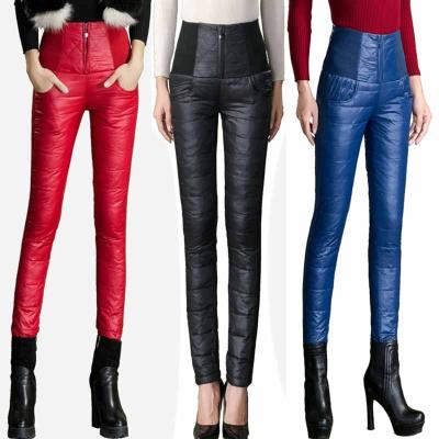 China Winter Windproof Women Down High External Women Duck Down Pants Skinny Trousers 90% White Thick Warm Slim Feminine Waisted Wear Pants for sale