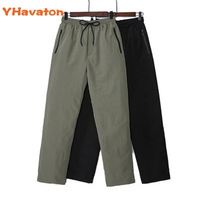 China Duck Down Pants Men Outdoor Wadded Warm Waterproof Thermal Pants Jogger Windproof Winter 5XL Plus Size Cold Resistant Clothing for sale