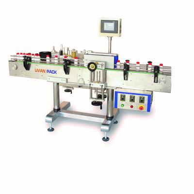 China TBK-630 Food Customized Automatic Adhesive Labeling Machine For Mango Juice Round Bottles for sale