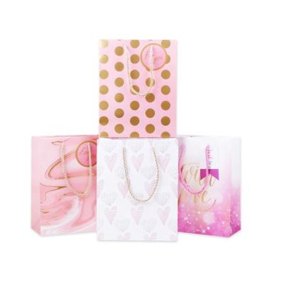 China Small Recyclable Custom Luxury Paper Bags Wedding Candy Gift Bag For Candy Packaging Chocolate for sale