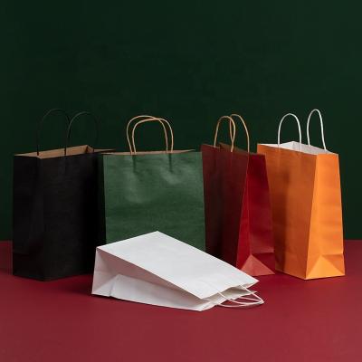 China Recycled Materials Garment Paper Cheap Luxury Paper Shopping Bags With Logo Print for sale