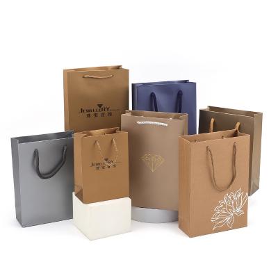 China Custom Recycled Paper Bags Wedding Gift Clothing Packaging Logo Luxury Pink Shopping Bag Materials Silver Foil For Boutique for sale