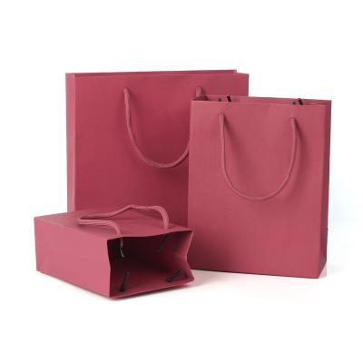 China High Quality Red Paper Shopping Bag Recycled Materials With Hot Stamping Logo for sale