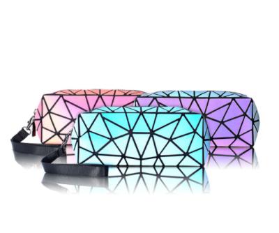 China Luminous Makeup Organizer Bag Cosmetic Pouch New Change Geometric Chameleon To Make Up Cosmetic Bag for sale