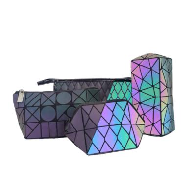 China Luminous Travel Make Up Bag Cosmetics Organizer Lady Makeup Bags New Women Geometric Cosmetic Zipper Makeup Organizer Bag for sale