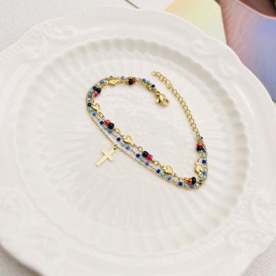 China Religious Ethnic Three-Layer Multicolor Beads Chain Bohemian Jewelry 18K Gold Plated Stainless Steel Cross Pendant Bracelet for sale