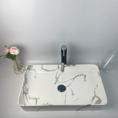 China Modern ceramic basin over the long white gray marble sink art basin for sale