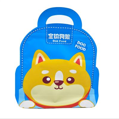 China Cute Blue School Bag Shape Flat Bottom Big Bag Of Cat Food Treat Packaging With Handle And Zipper for sale