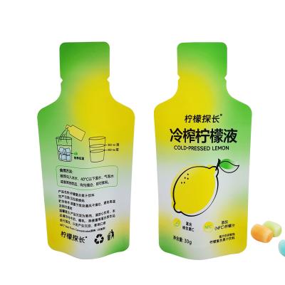 Chine Bouteille imprimée à l' odeur sur mesure en forme de poche debout avec encas de larme enduit de papier pour emballage de boissons au jus de citron à vendre