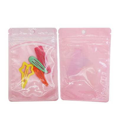 China Custom Printed Pink Color One Side Clear Pouch Plastic Bags with Zipper with Hanging Hole for Candy, Cookie, Accessories for sale