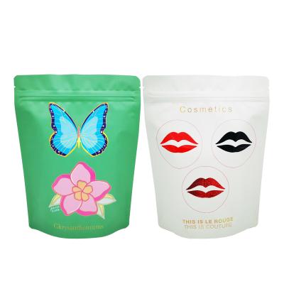 China Luxury Design Glossy Spout UV Printed Custom Resealable Pouches With Zipper For Cosmetics Packaging for sale