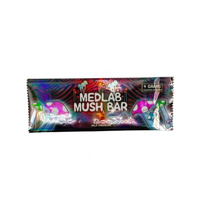 China 4 Grams Holographic Fin Seal Pouch with Jagged Tear Notch on Top Bottom for Milk Chocolate Bar Mushrooms Candy Packaging for sale