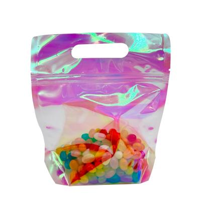 China Custom Pink Radiant Holographic Color Stand Up Bags with Zipper and Handle Hole for Food Accessories Packaging for sale