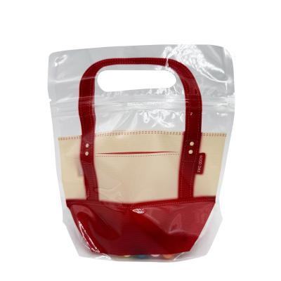 China Bolso de mano de diseño de plástico Stand Up Bolsas de cremallera para el embalaje de alimentos galletas dulces frutas en venta