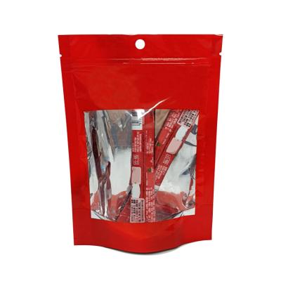 China Glossy Red Resealable Ziplock Custom Printed Coffee Bag with Clear Window Foil Back Bottom for Packaging Instant Coffee for sale