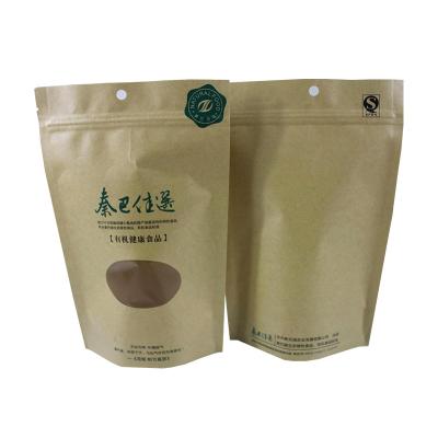 China Bolsas de bolsillo de papel Kraft con ventana redonda personalizada para hojas de té y frijoles en venta