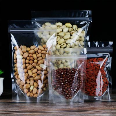 China Plastic Resealable Clear Stand Up Pouch Bags with Zip Lock with Tear Notch for Candy, Snacks, Dry Fruits, Food Packaging for sale