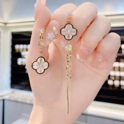 China Fashion s925 needle silver super fairy asymmetrical four-leaf flower long tassel drop earrings for women for sale