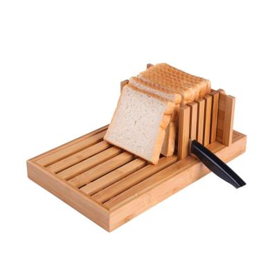 China Sustainable Natural Wooden Bread Slicer Panel Bamboo Bread Cutting Board With Crumb Catcher for sale