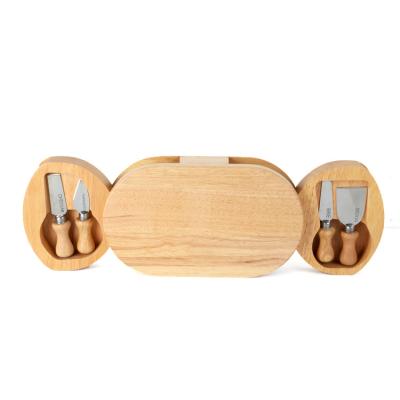 China Customized Sustainable Two Slide-Out Wooden Drawer Cheese Oval Serving Board Set With 4 Piece Cheese Tool for sale