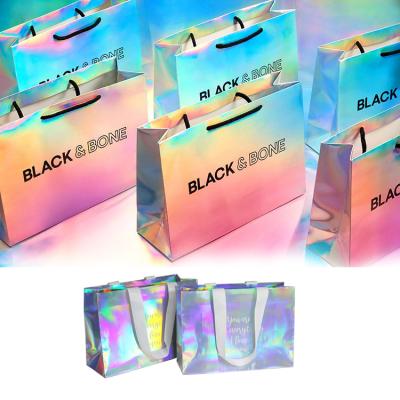 China Handmade Custom Your Own Logo Printing Holographic Mini Gift Private Label Apparel Paper Bags Small Luxury Paper Shopping Bag With Handle for sale