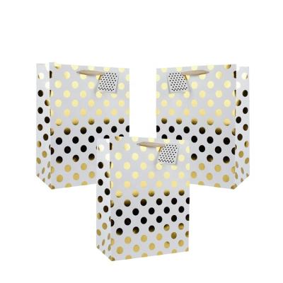 China Recyclable Custom Design Gold Polka Dot Gift Paper Bags With Hot-stamping Handle for sale