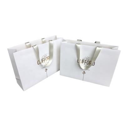 China Recyclable Luxury Strong Retail Gift Shopping Carrying Large Paper Bags With Custom Your Own Logo for sale