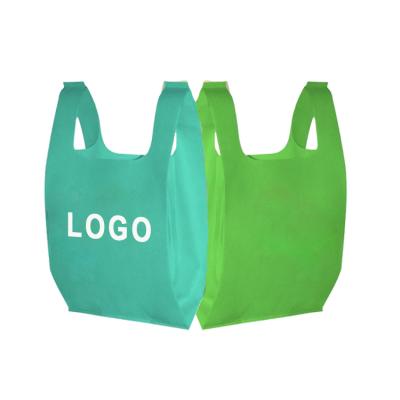 China Eco Friendly Plain Or Custom Recycle Wholesale Reusable Eco Friendly Recyclable T-shirt Nonwoven Cut Non Woven Vest Shopping Bag With Logo for sale